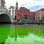 The water of the Grand Canal in Venice turned bright green